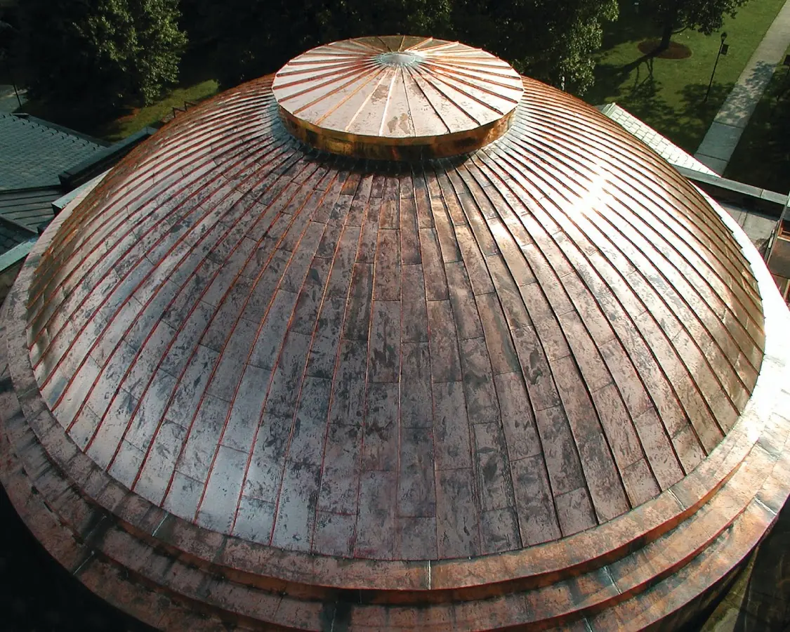 Craftsman Roofing crew installing a new roof in North Andover Center